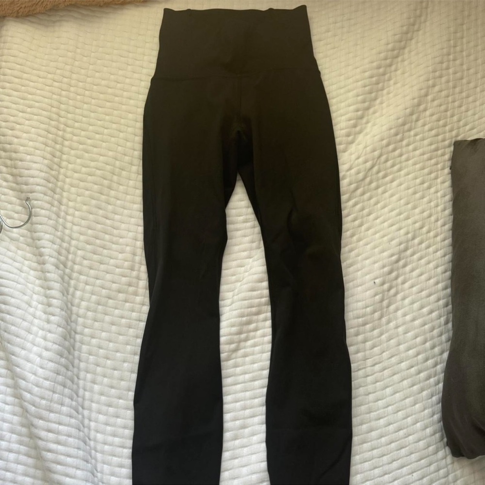 Lululemon black leggings with mesh along the sides
